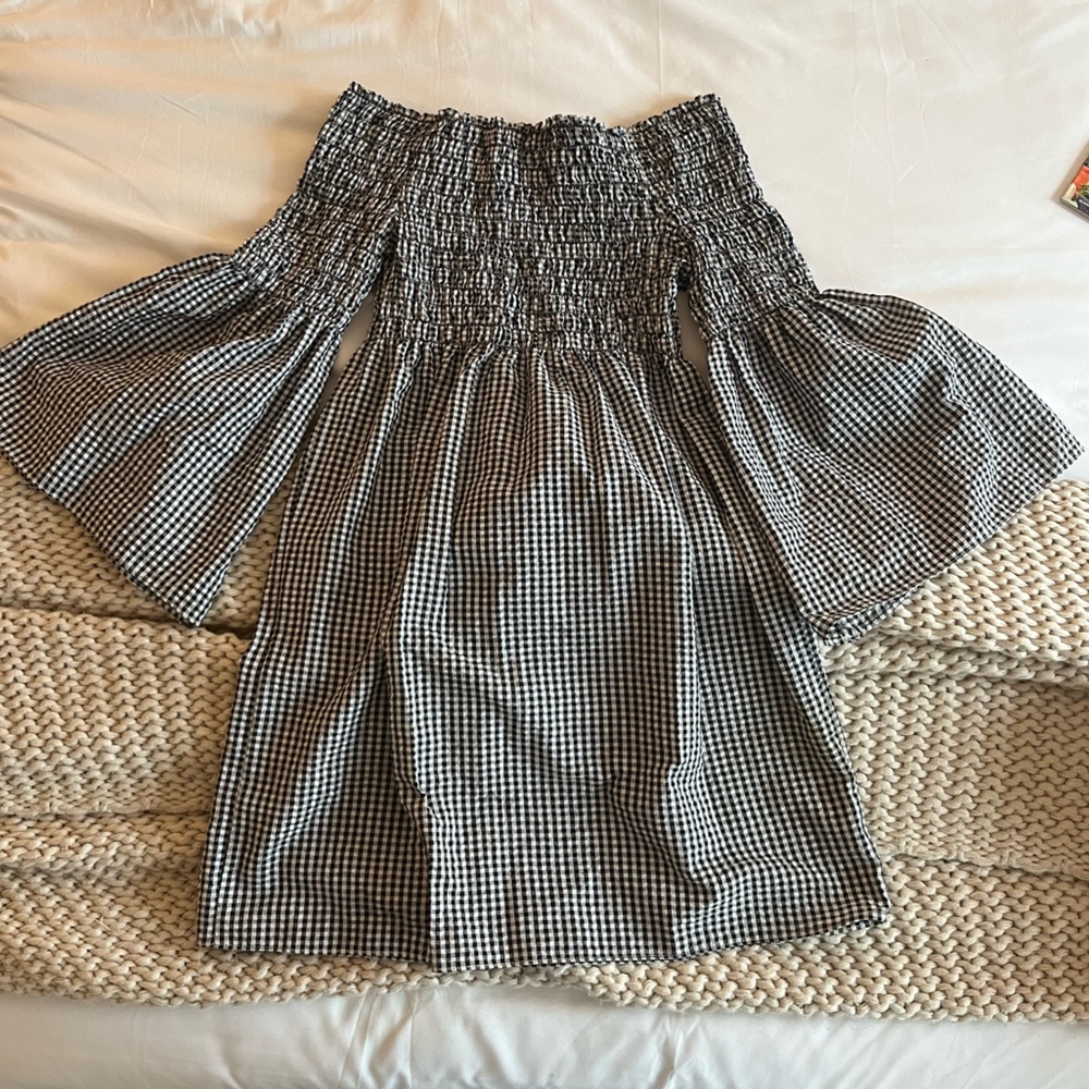 Strapless black and white gingham dress with bell sleeves